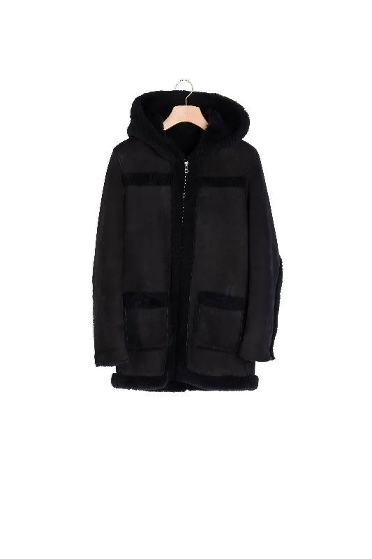 Manteau long en peau lainée à capuche